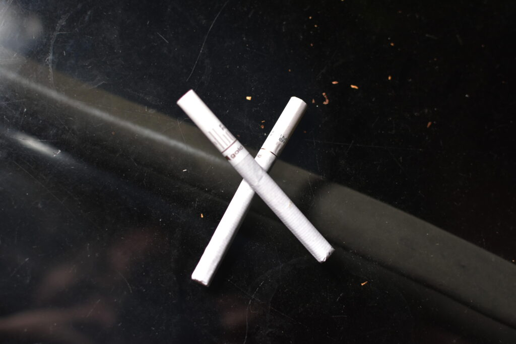 X symbol Marlboro lights Cigarette