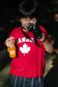 Desmond drinking orange soda